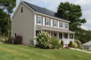 House with Vinyl siding: Vision Roofing is a house siding repair contractor in Charlotte, NC.